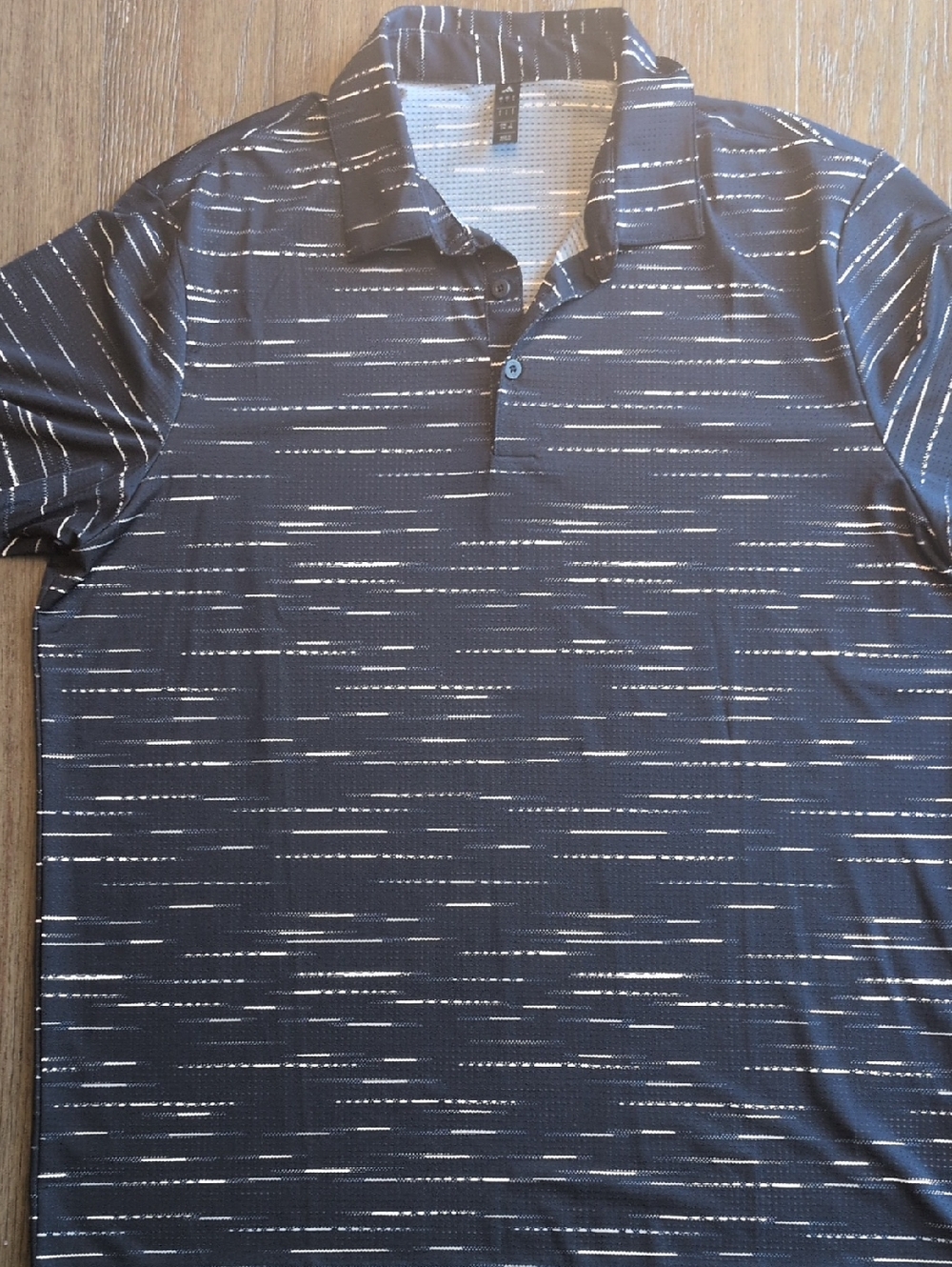Adidas Men's Black Polo with White Dash Stripe Pattern